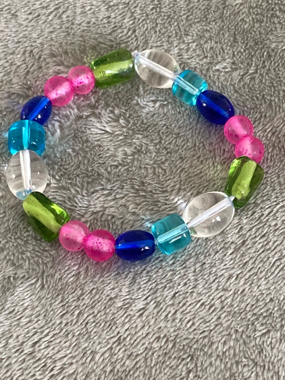 Pink, green, blue and clear glass bead bracelet